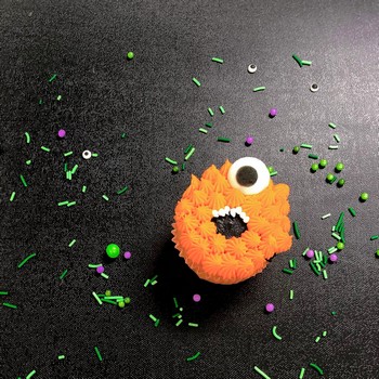 One-Eyed Orange Monster Cupcake