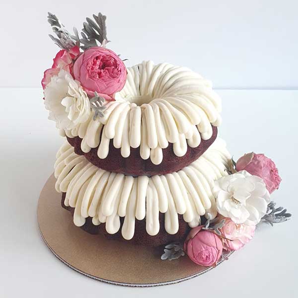 two-tier wedding bundt cake with roses