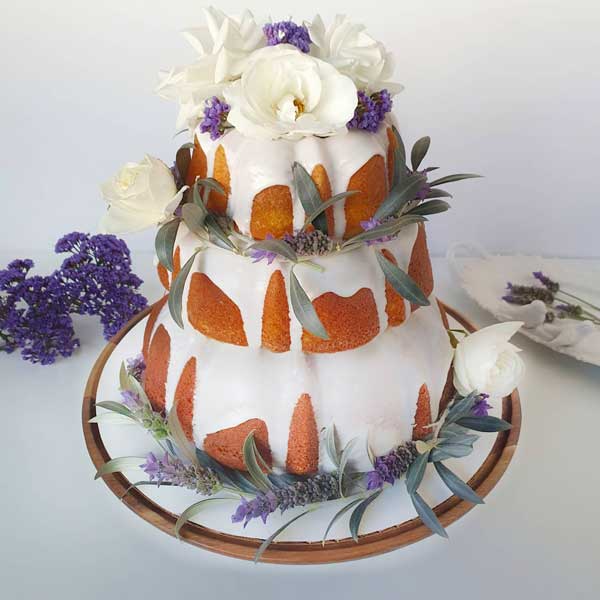three-tier wedding bundt cake with flowers