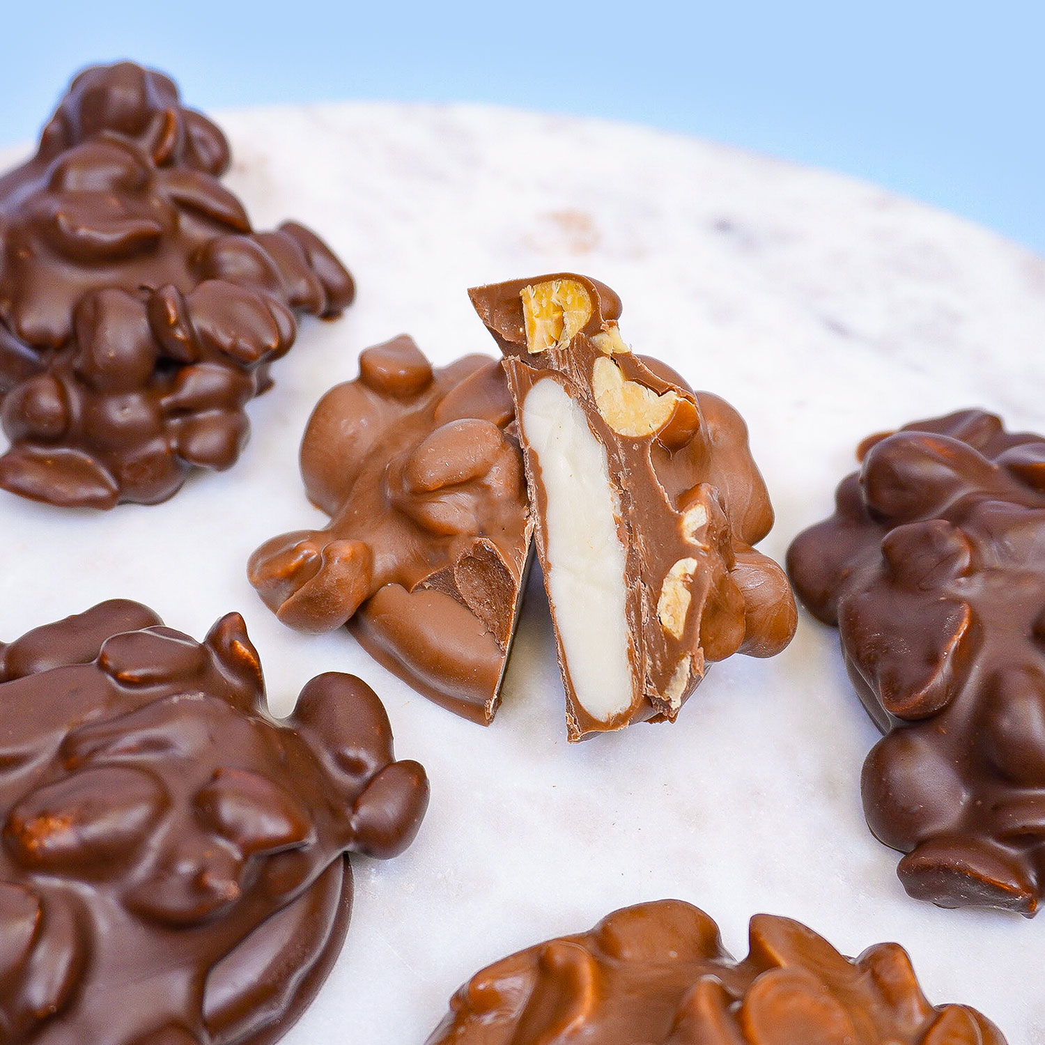 chocolates filled with vanilla cream center and peanuts