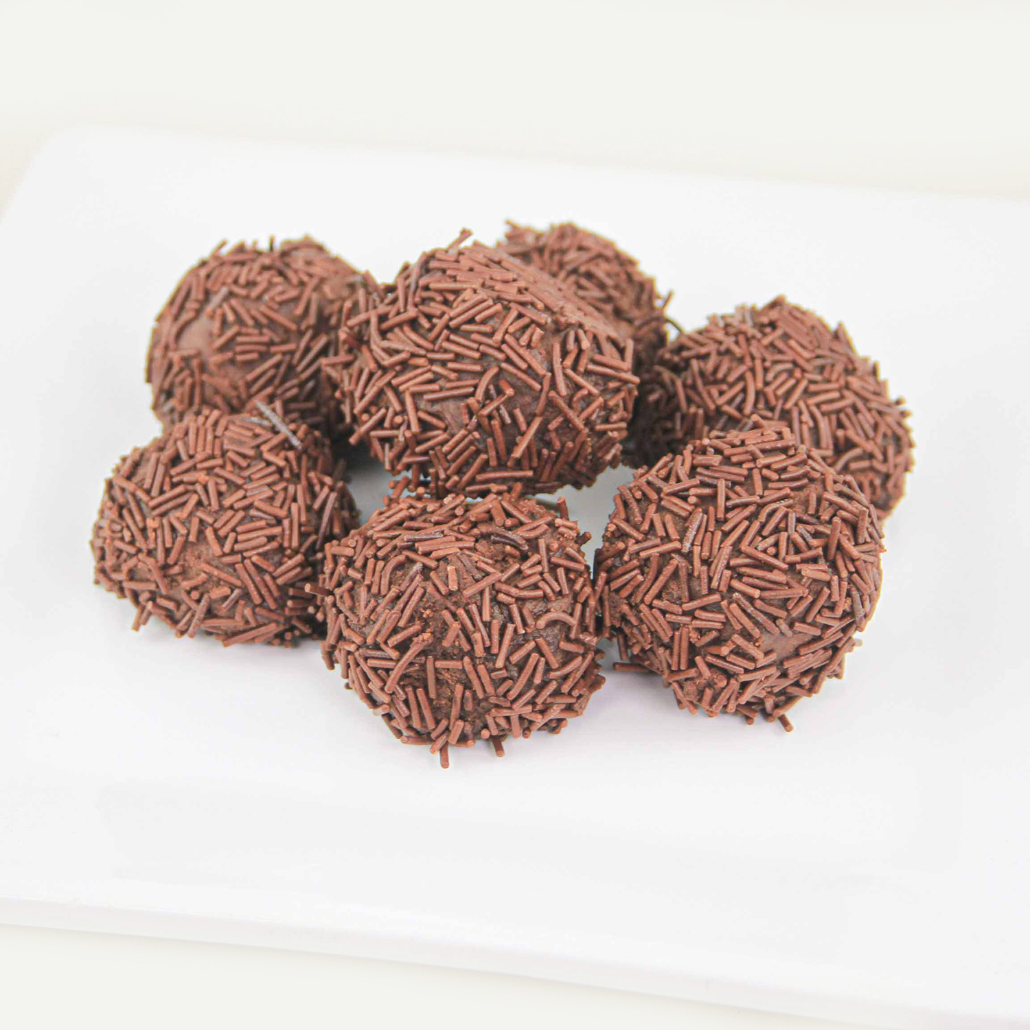 Whipped Mocha Truffles covered in fine chocolate jimmies called vermicelli.