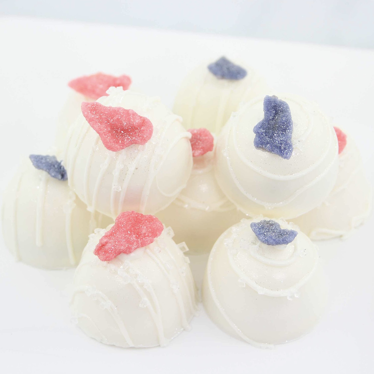 Lavender and rose water truffles with candied rose and violet petals