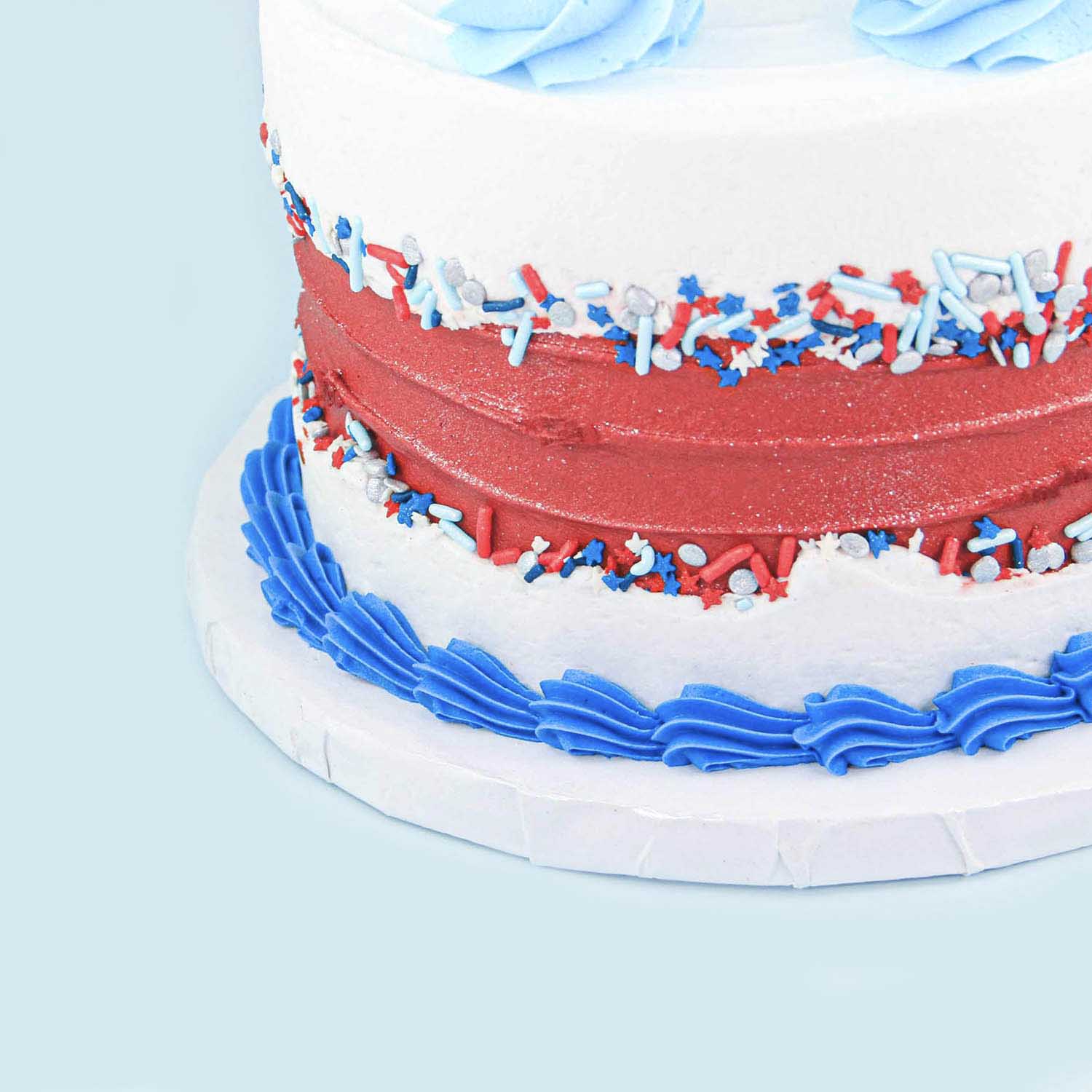 Decorated Patriotic Fault Line done in red buttercream and red white and blue sprinkles