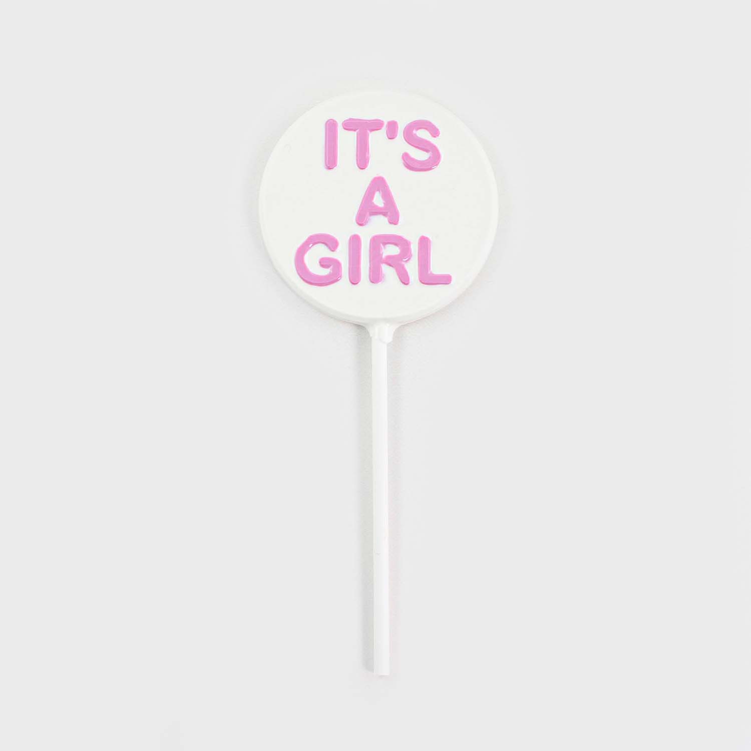 "It's a Girl" chocolate molded sucker. white chocolate with pink words.