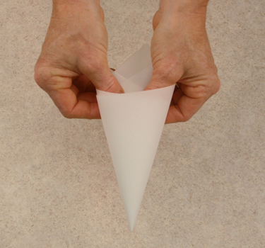 parchment paper cone for piping icing and chocolate