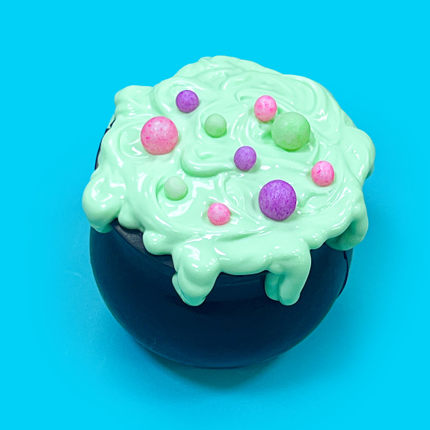 glow in the dark sugar pearls on hot chocolate bomb