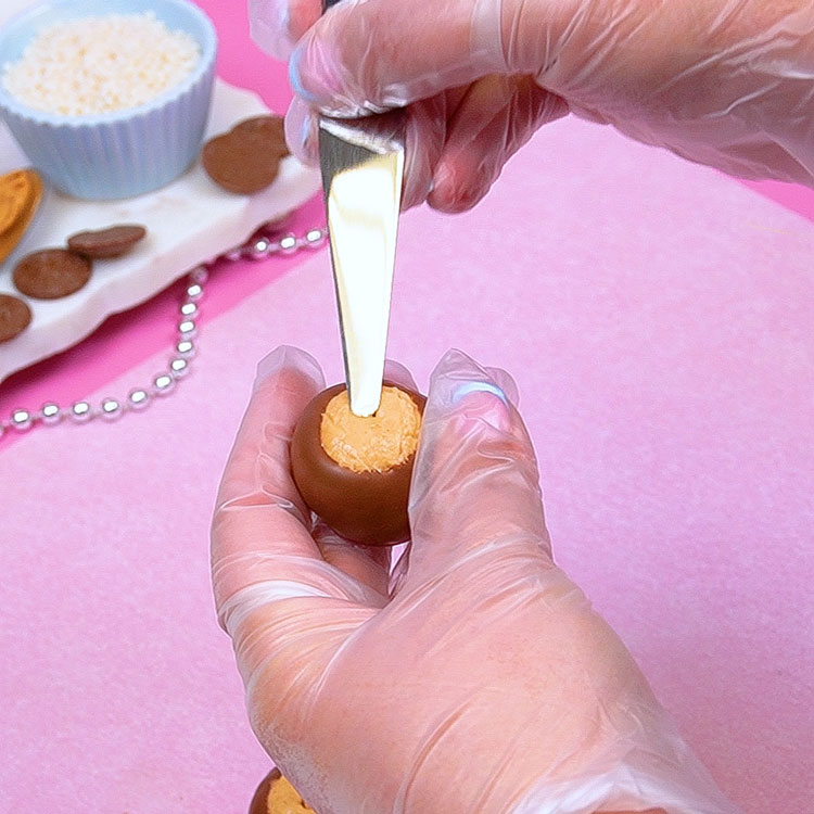 removing toothpick from buckeye and smoothing hole