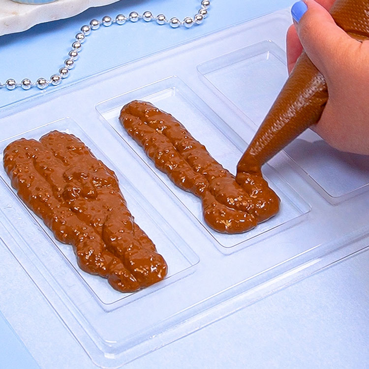 filling chocolate mold