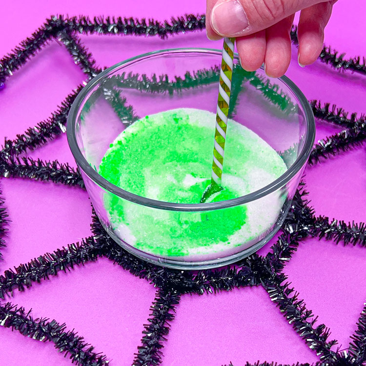 bowl with sugar and green rolkem lumo powder and citric acid