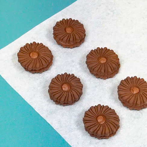 oreo cookies on parchment paper