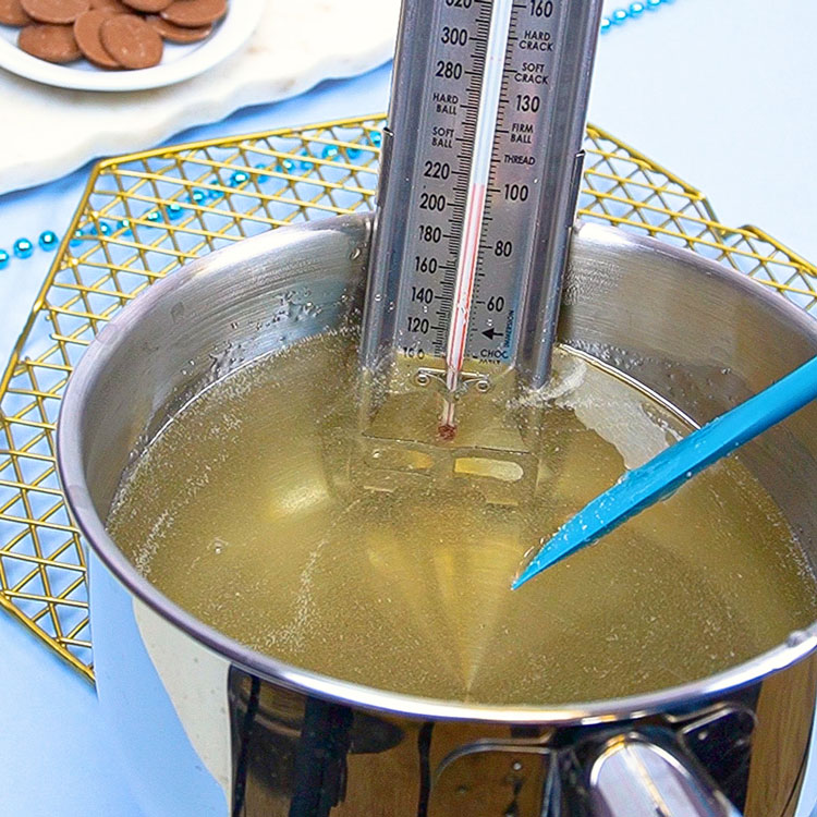 invert sugar and light corn syrup heated in pan with candy thermometer