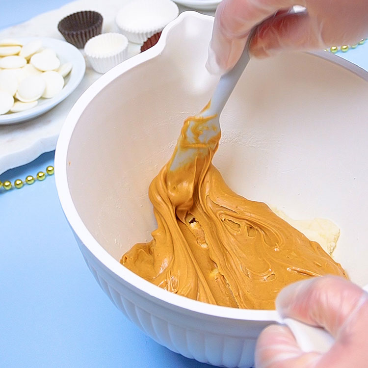 mixing peanut butter candy center ingredients