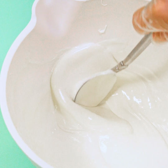 stirring flavoring into melted chocolate