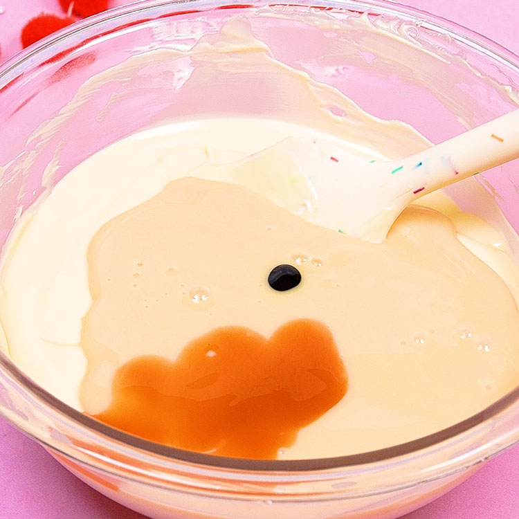 melted white chocolate with flavoring sweetened condensed milk and food color