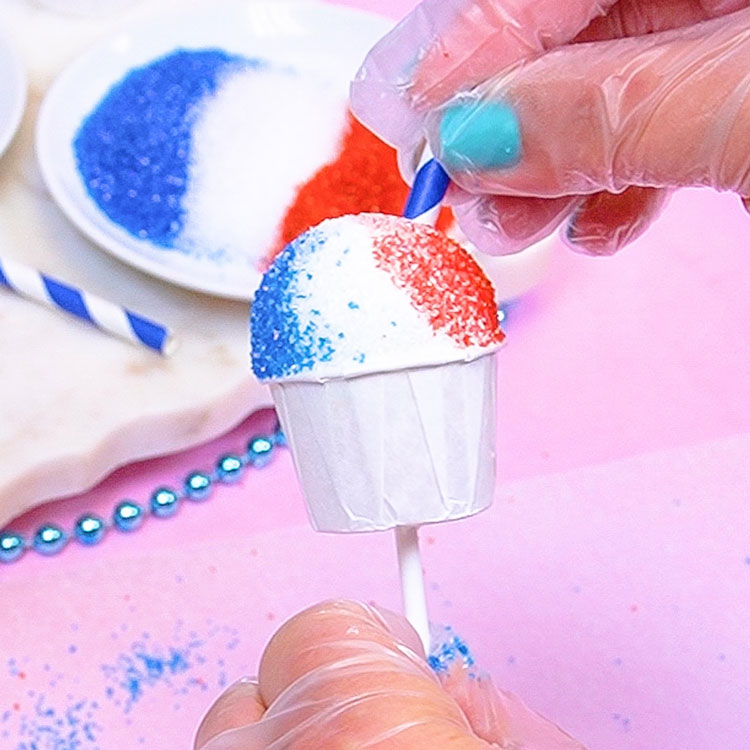 decorating snow cone cake pop with paper straw